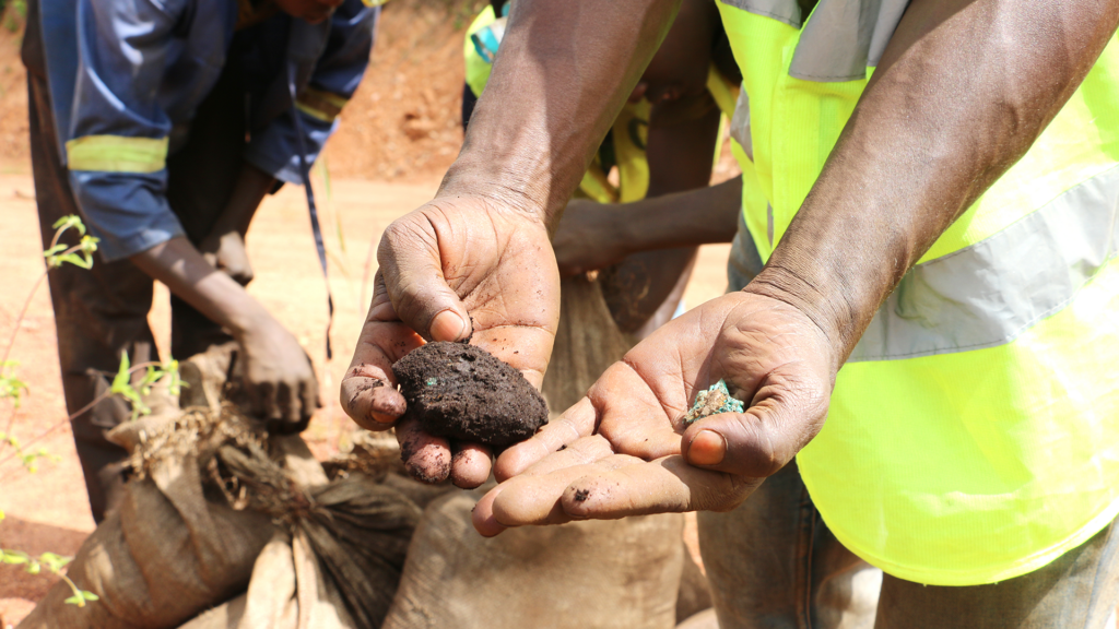 The mineral ores extracted from ASM sites leave the mines in burlap bags to be sold at local marketplaces, called depots.